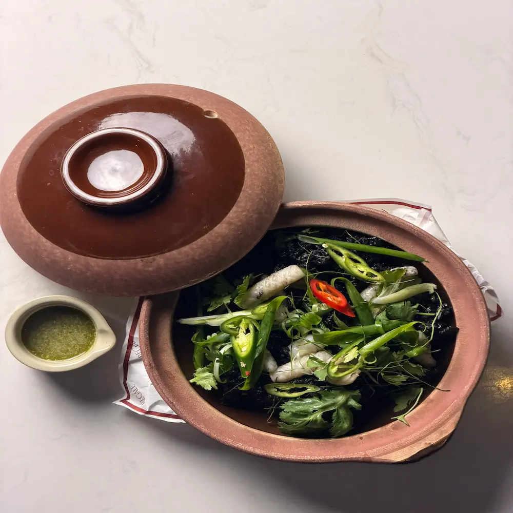 Squid Ink Claypot - Thai fine dining dish at Regale Restaurant Carlton Melbourne